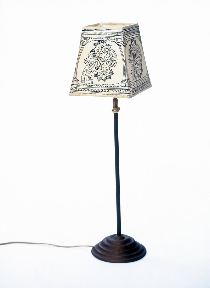 Close-up of electric floor lamp on white background