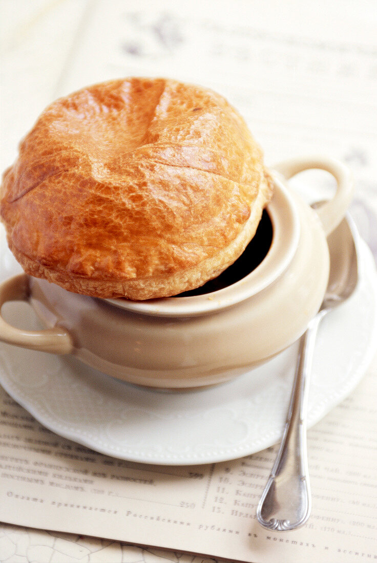 Cabbage soup served with bread in Cafe Pushkin, Moscow, Russia