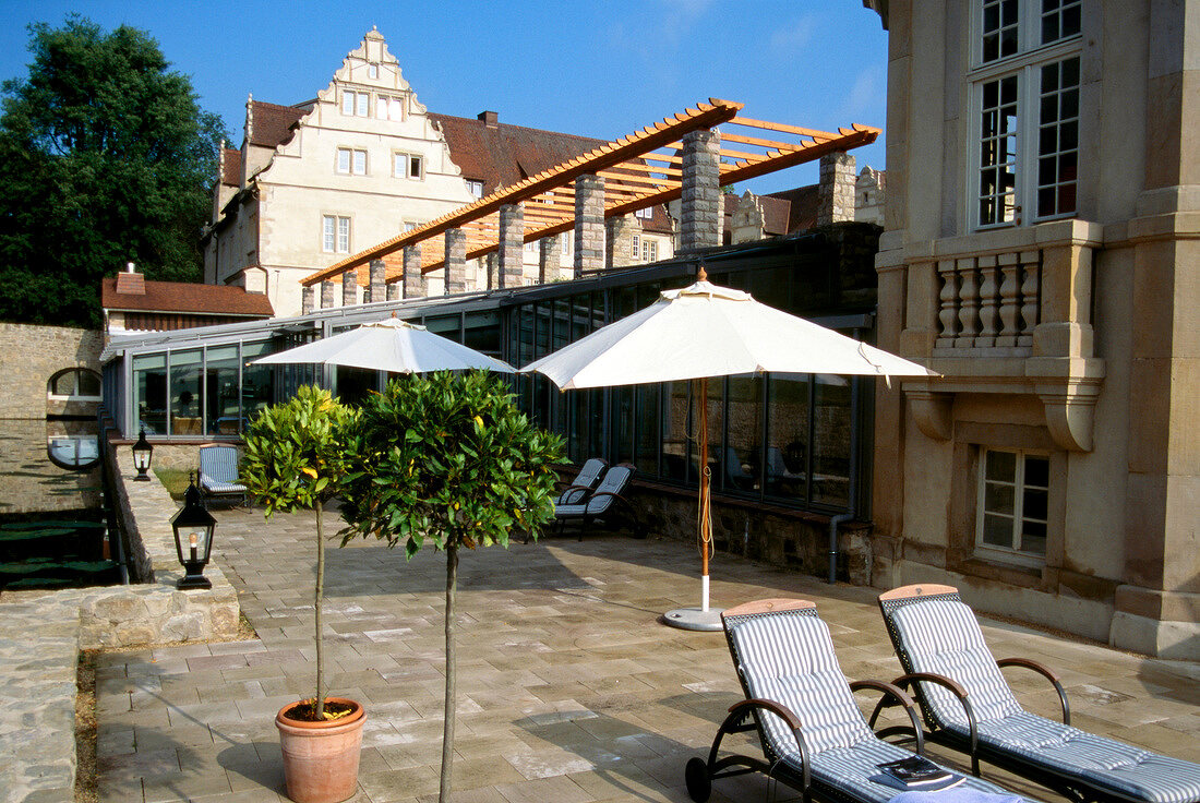 Terrace with sun beds at Schlosshotel Munchhausen, Germany