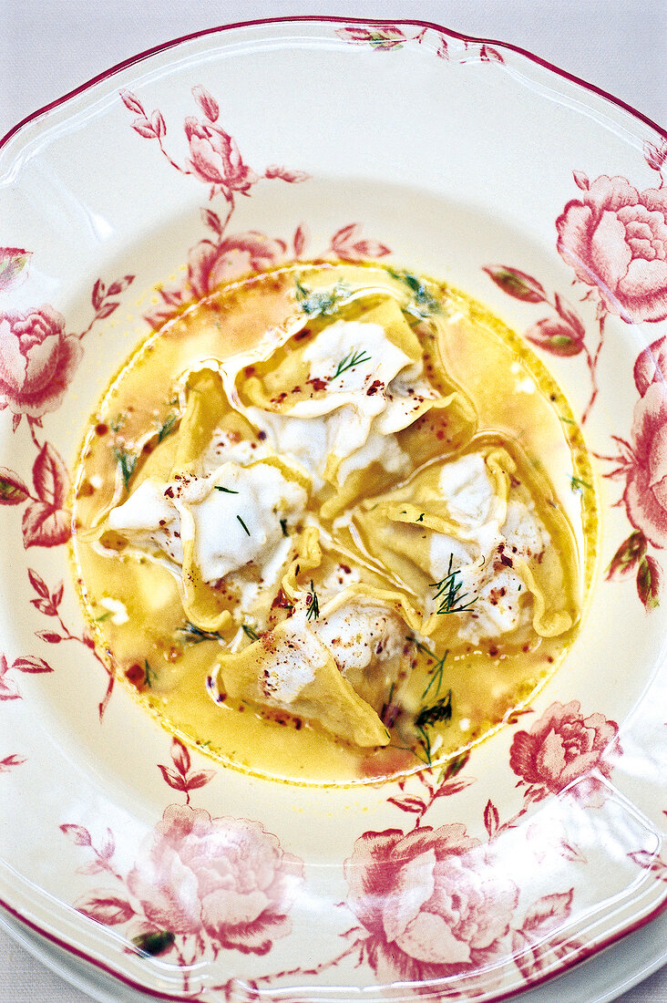 Close-up of ravioli stuffed with oxtail on plate