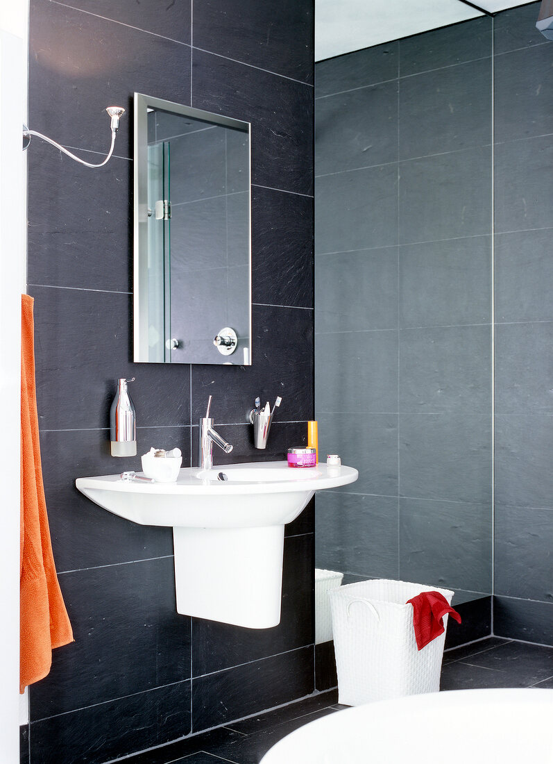 White sink and mirror in bathroom