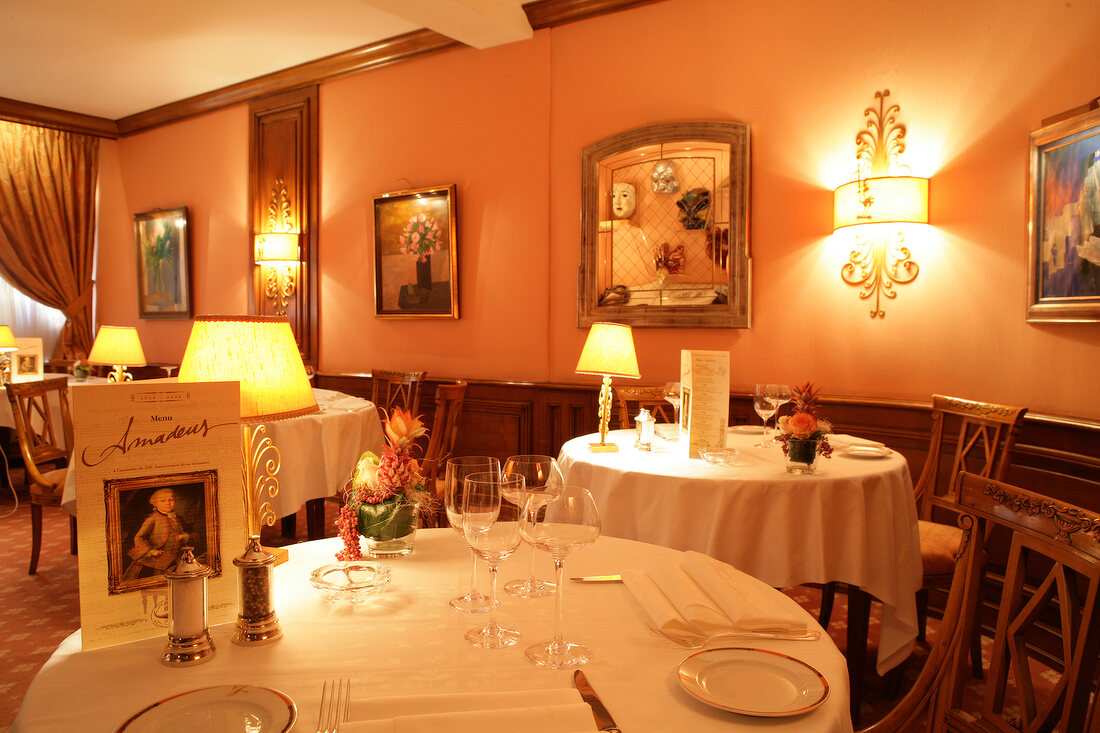 Tables laid in restaurant, France