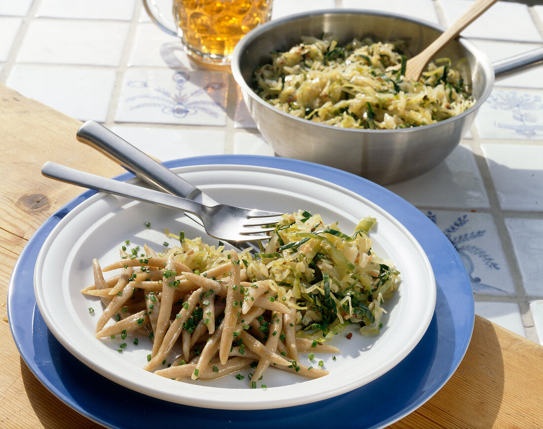 Potato noodles with Bavarian cabbage on plate