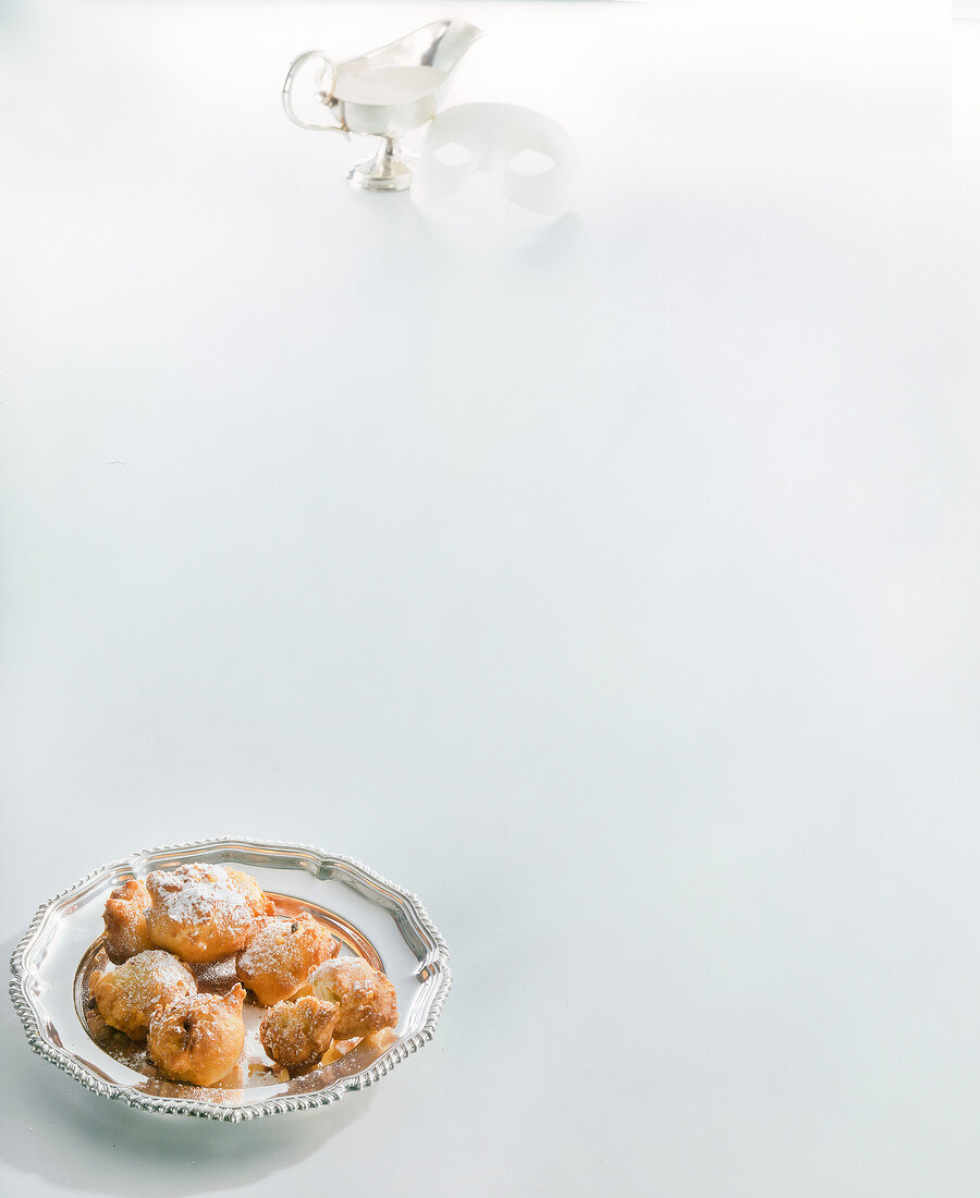 Donuts on silver plate, copy space