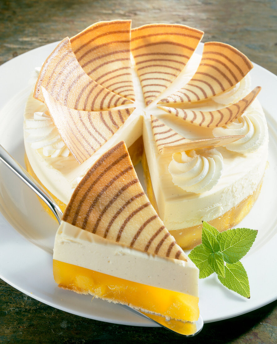 Close-up of mango cheesecake on plate