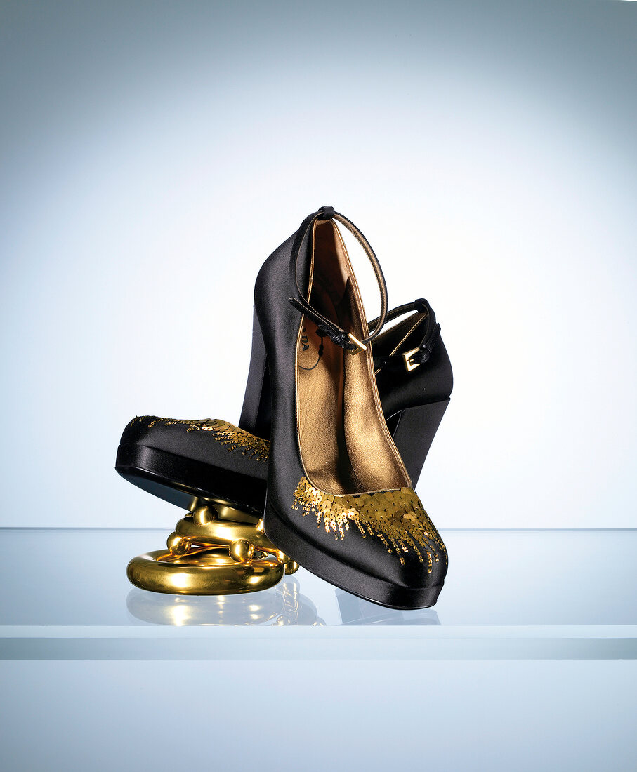 Pair of satin pumps with golden sequins