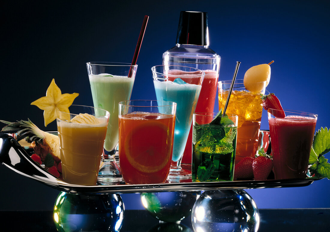 Close-up of variety of summer drinks on tray