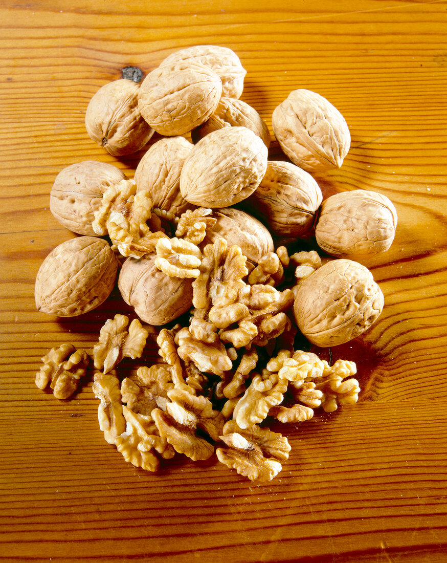 Close-up of walnuts with and without shell