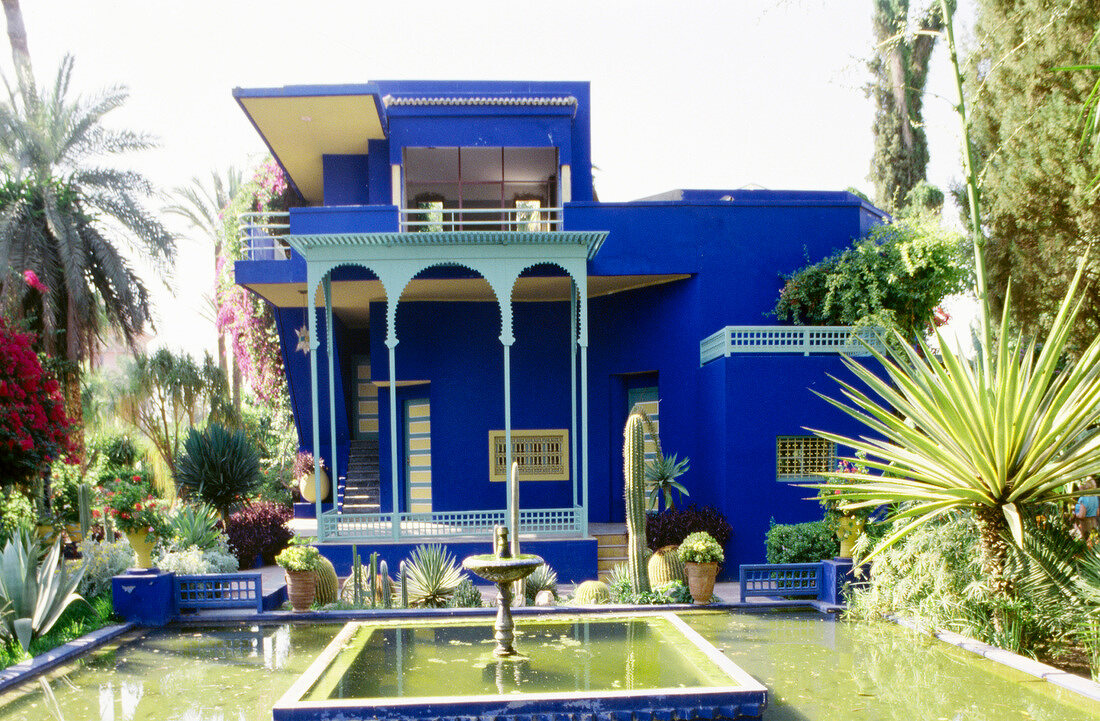 View of Yves Saint-Laurent's blue house with garden and fountain