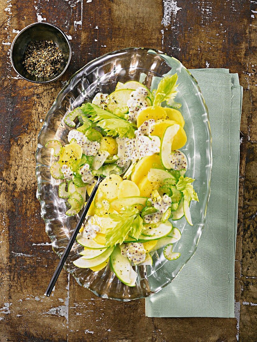 Potato salad with apples, celery and a mustard dressing