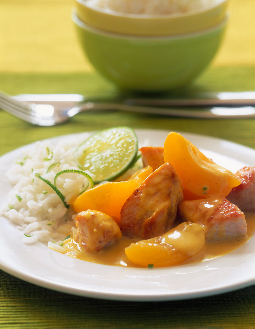 Turkey curry with apricots on plate