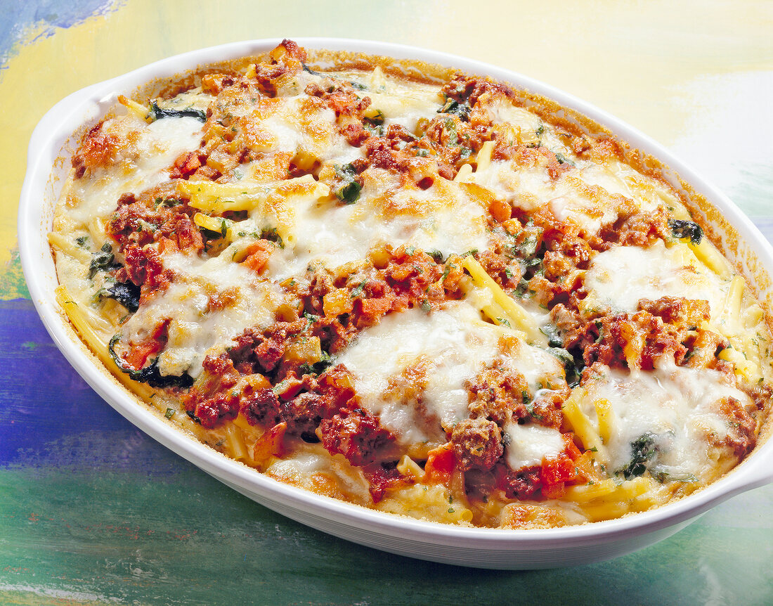 Beef with noodles and spinach in casserole