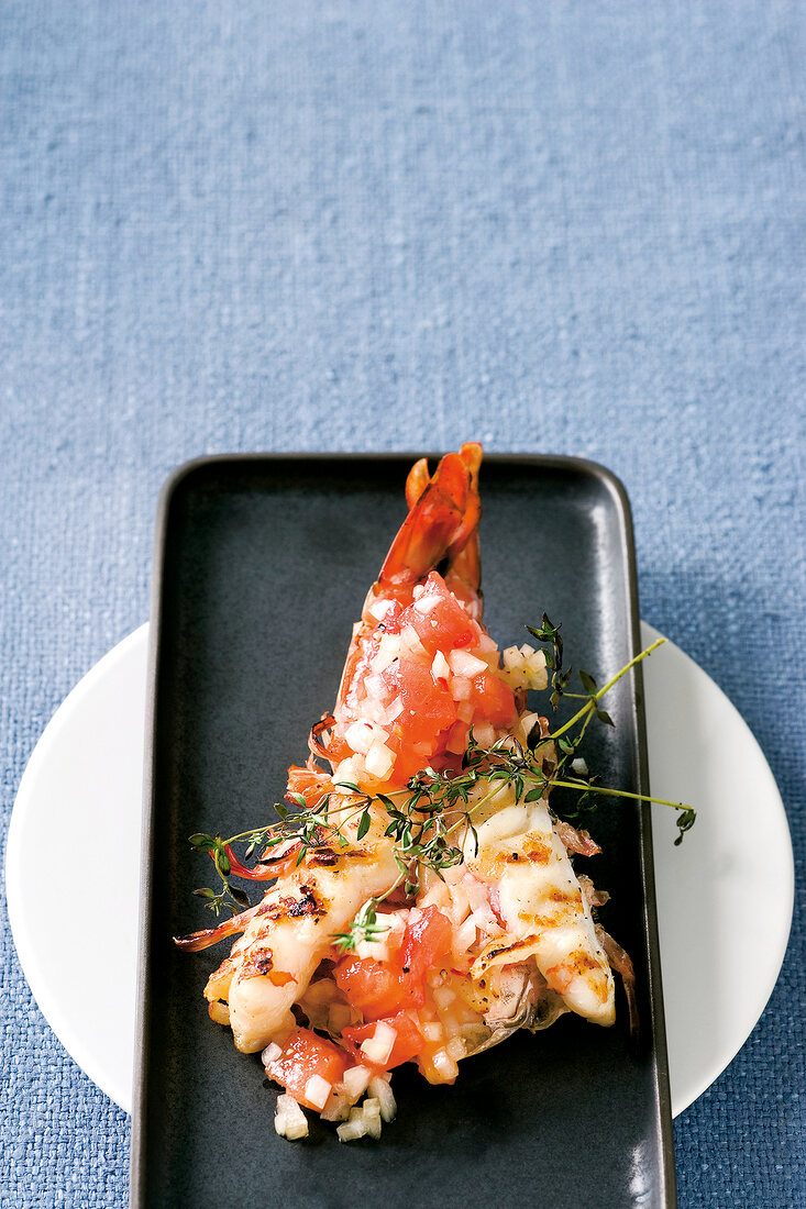 King prawns with spicy tomato salsa on tray