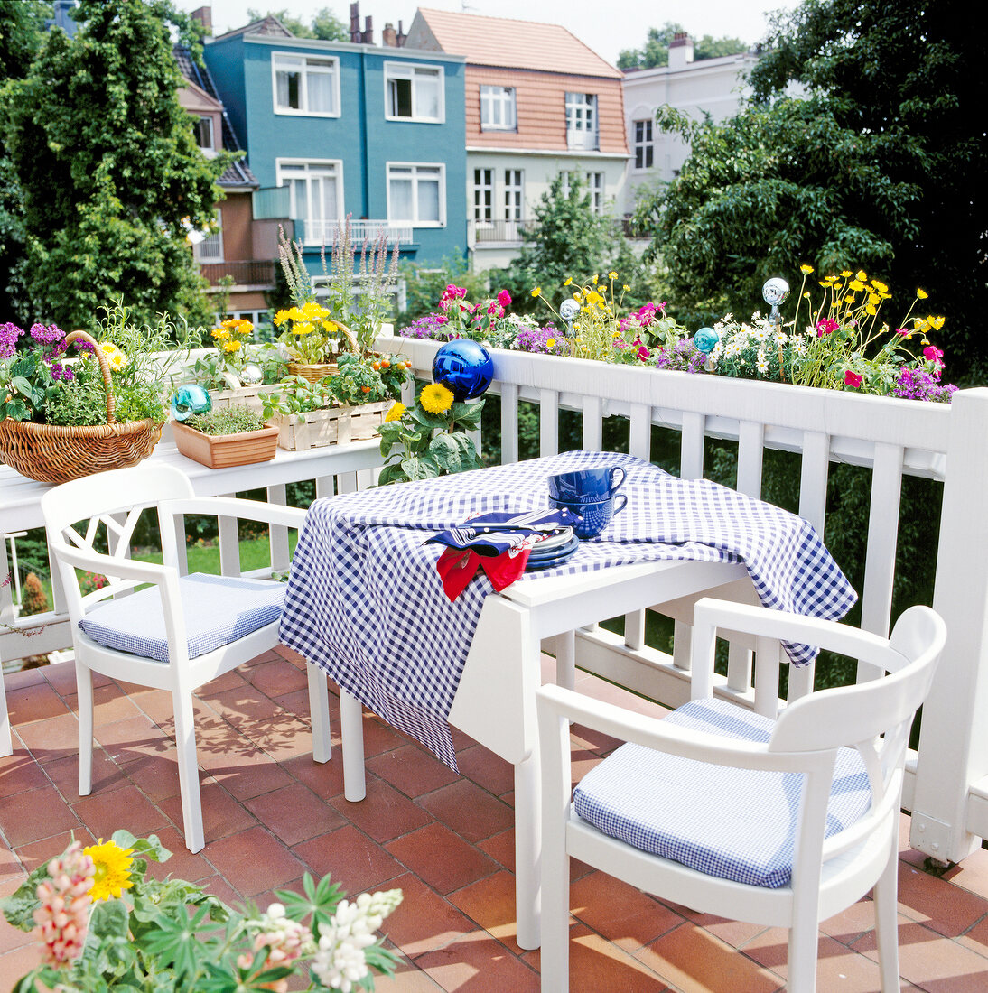 White table and chair with colourful in balcony