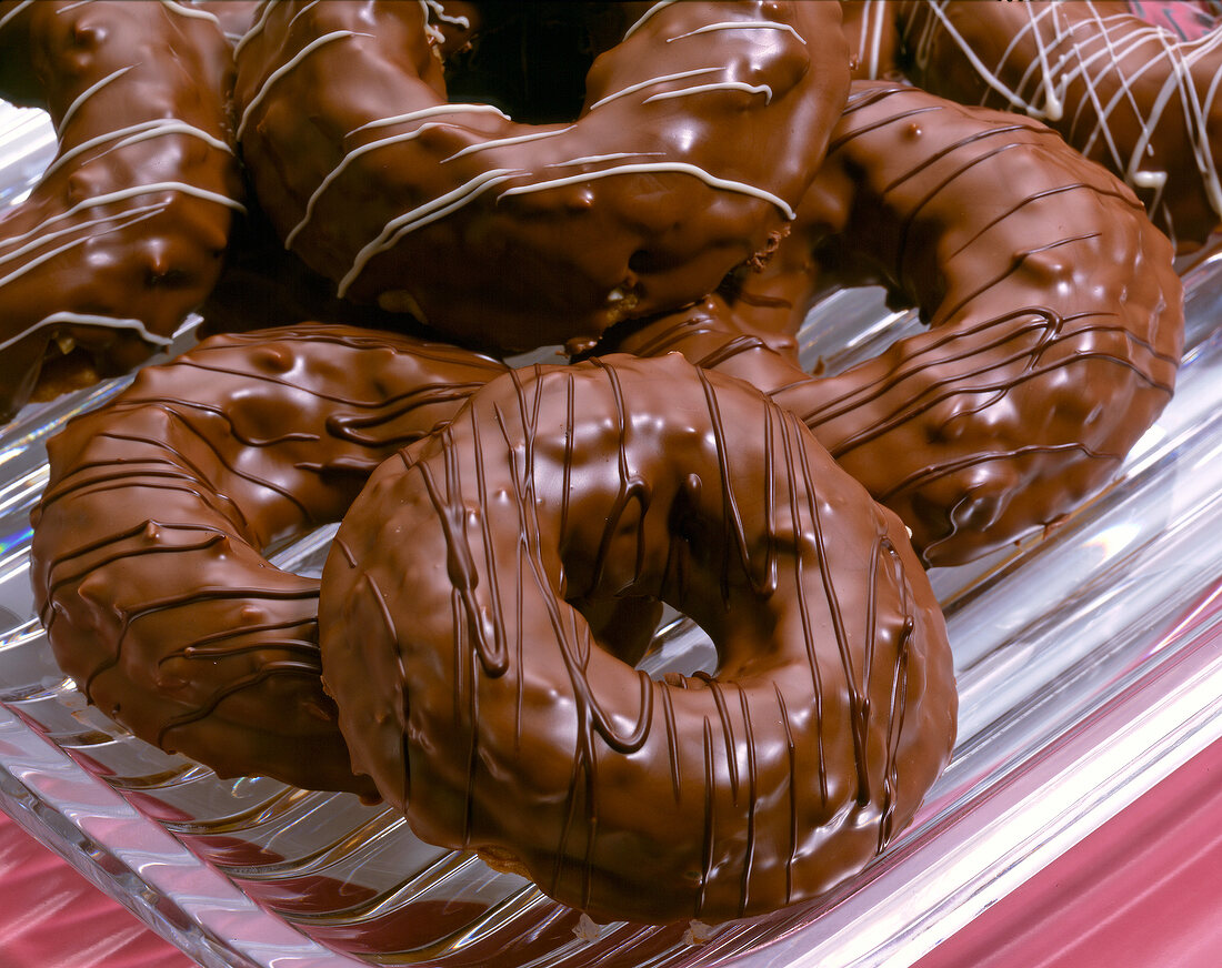Close-up of nougat with almonds in chocolate glaze rings