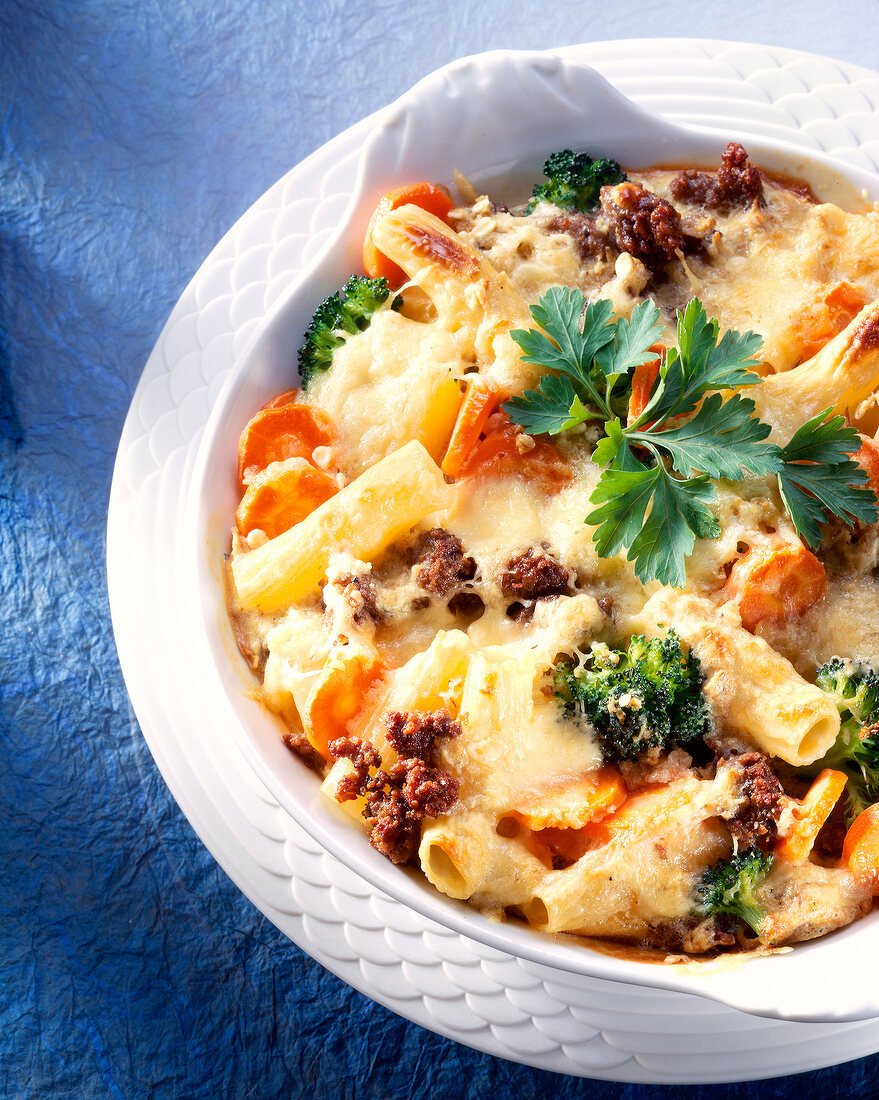 Close-up of carrots and broccoli in casserole