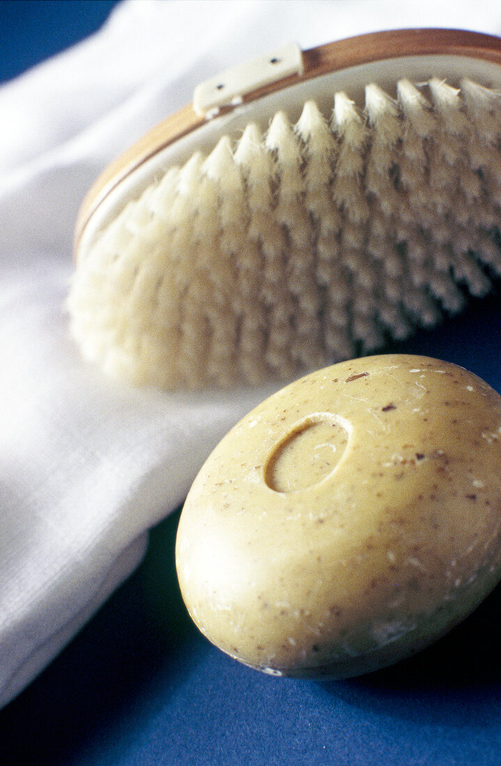 Close-up of massage brush and soap