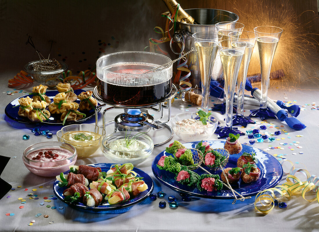 Dips, cheese packet, red wine punch, champagne, lamb meatball and confetti