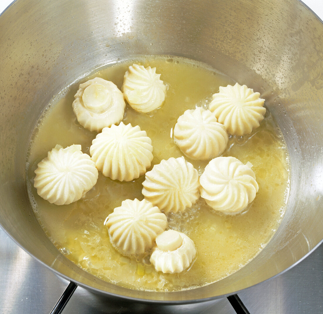 Close-up of mushrooms being cooked in pan, step 5