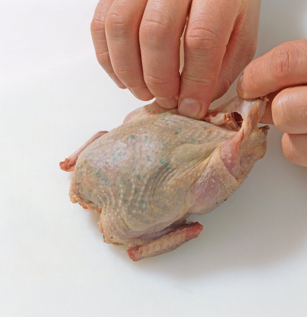 Quail being stuffed, step 10