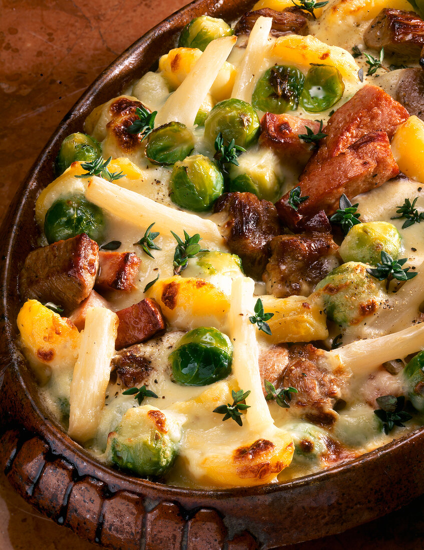 Close-up of Brussels sprouts casserole with potatoes, salsify and meat