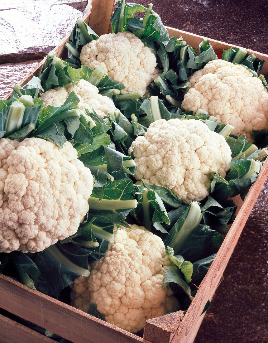 Close-up of white cauliflower in a wooden box