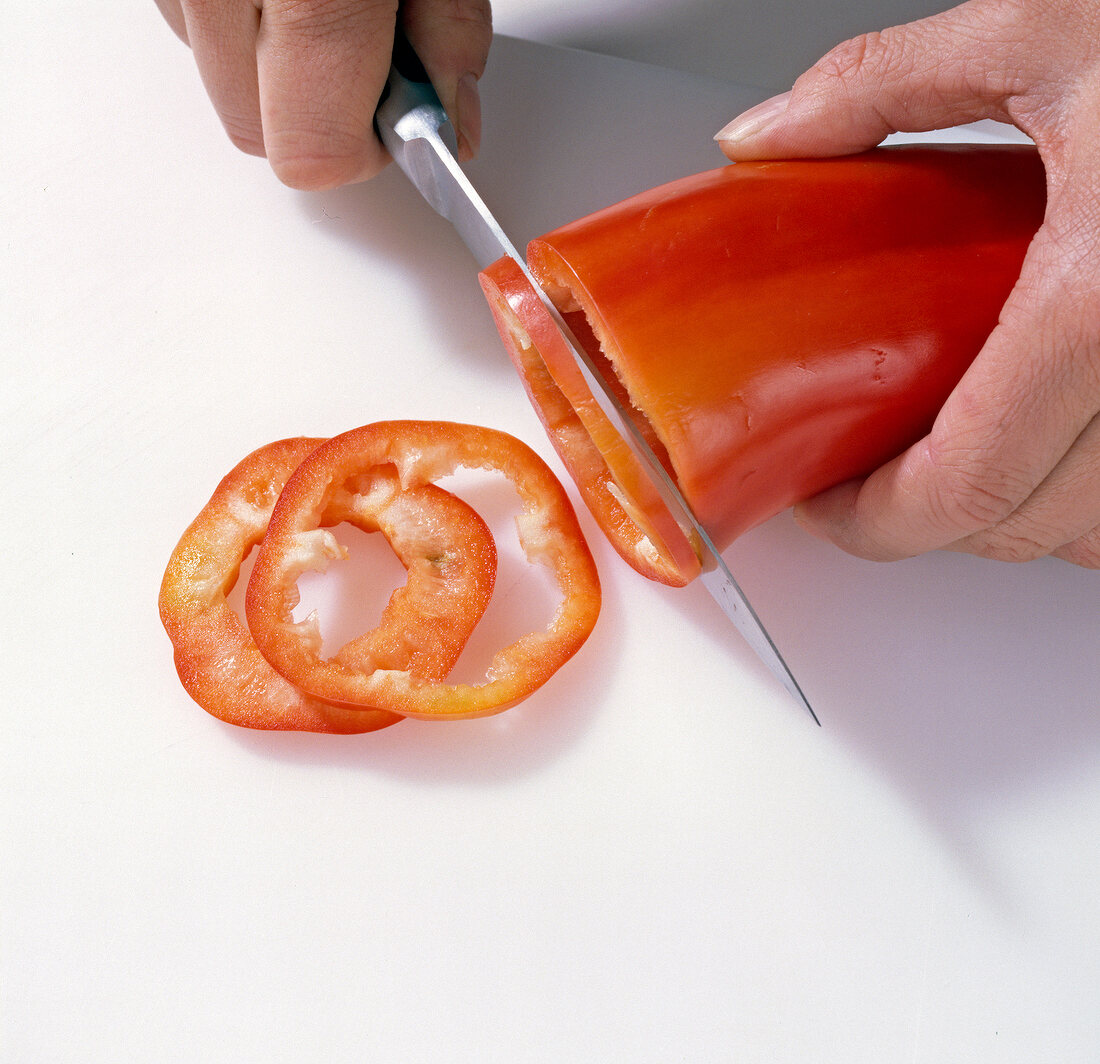 Close-up of sliced red pepper on chopping board, step 3