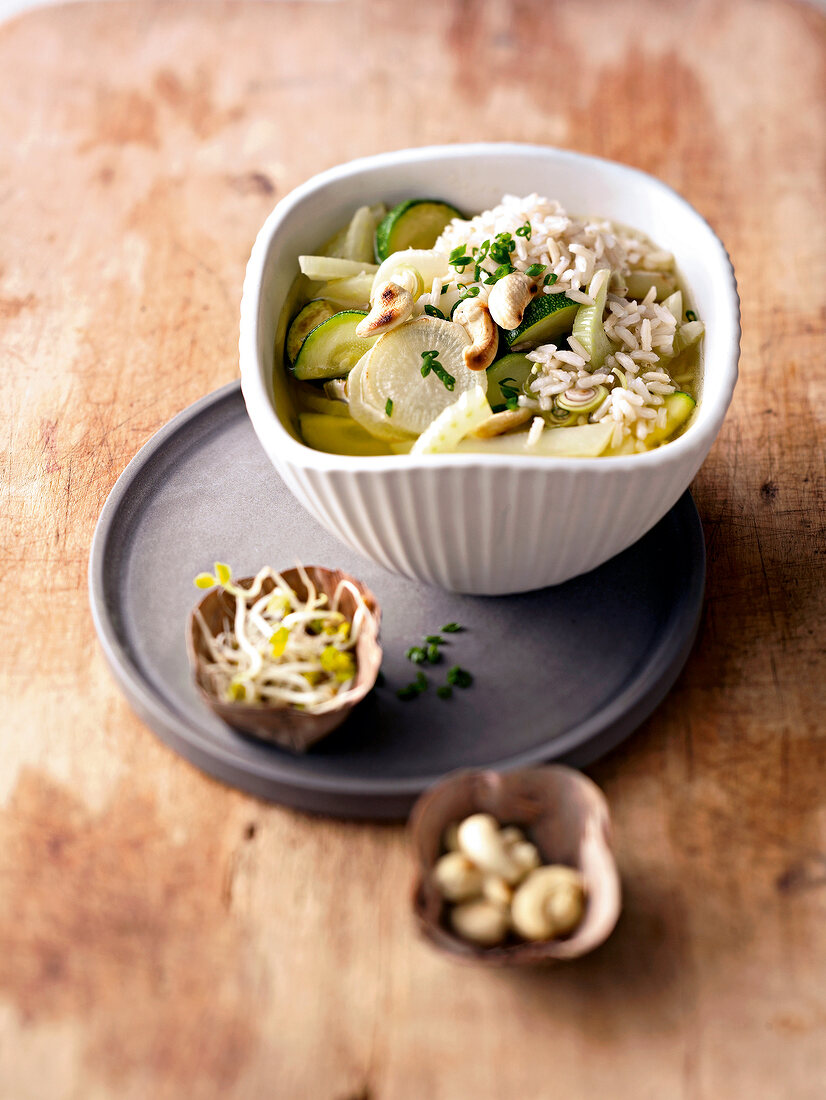 Vegetable soup with rice in bowl