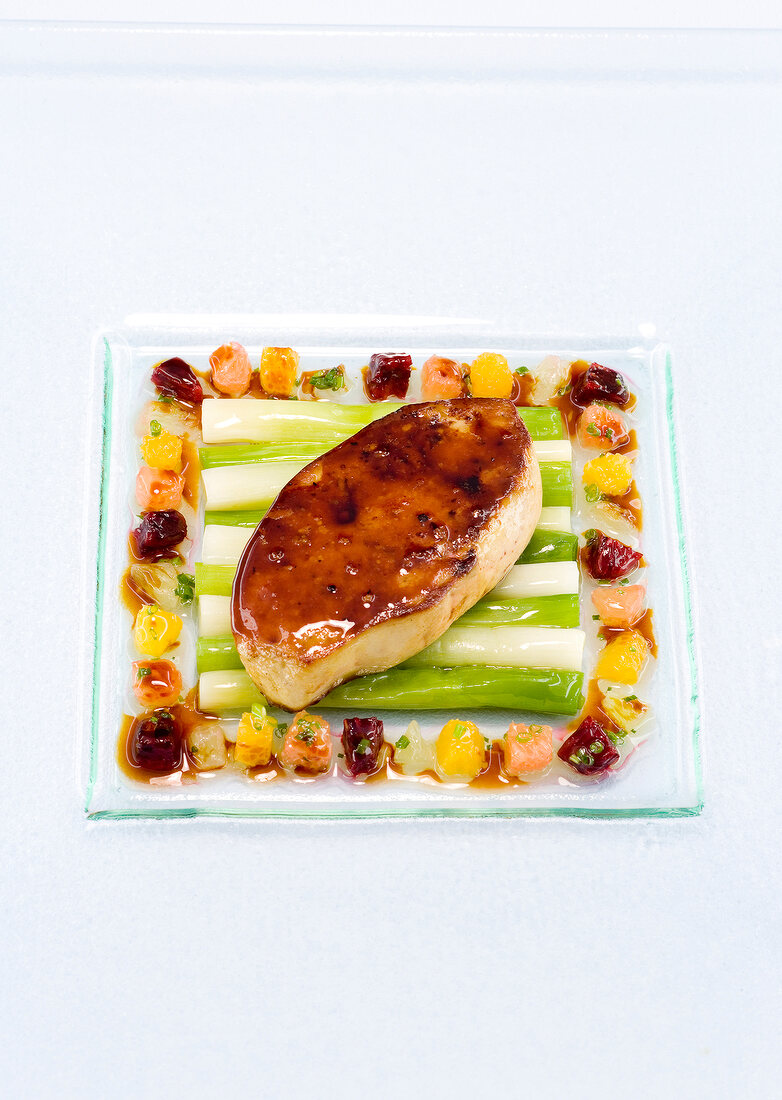 Fried foie grass on glass plate