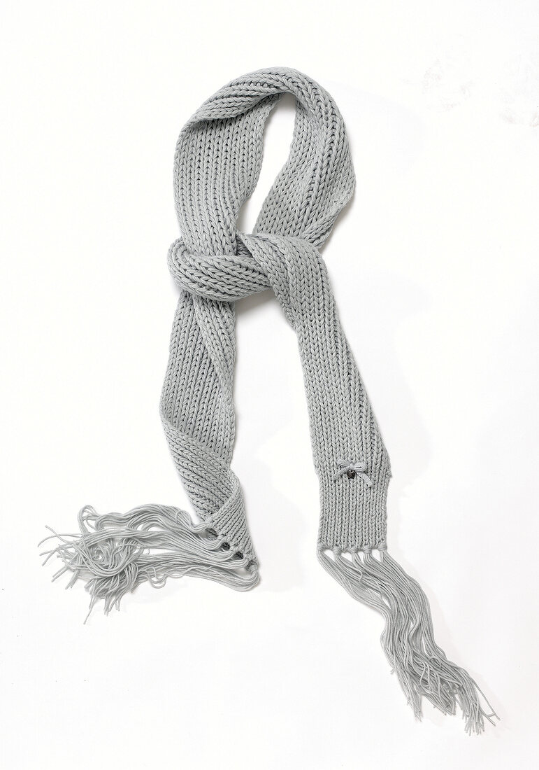 Close-up of gray scarf on white background