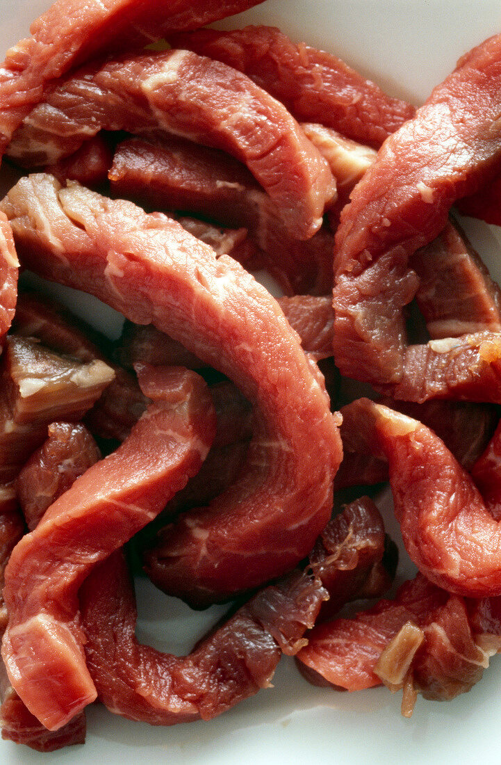 Close-up of meat cut into small pieces