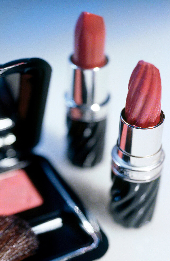 Close-up of lipstick and rouge