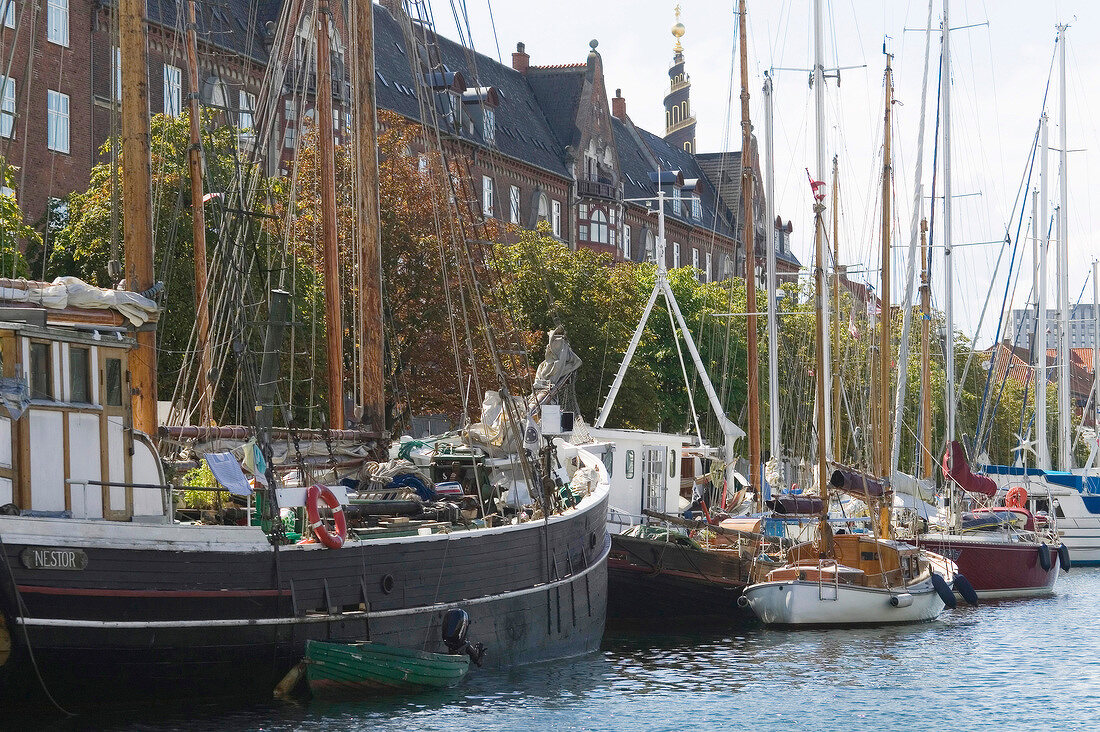 Sail boats moored at harbour in Christianshavn, Copenhagen, Denmark