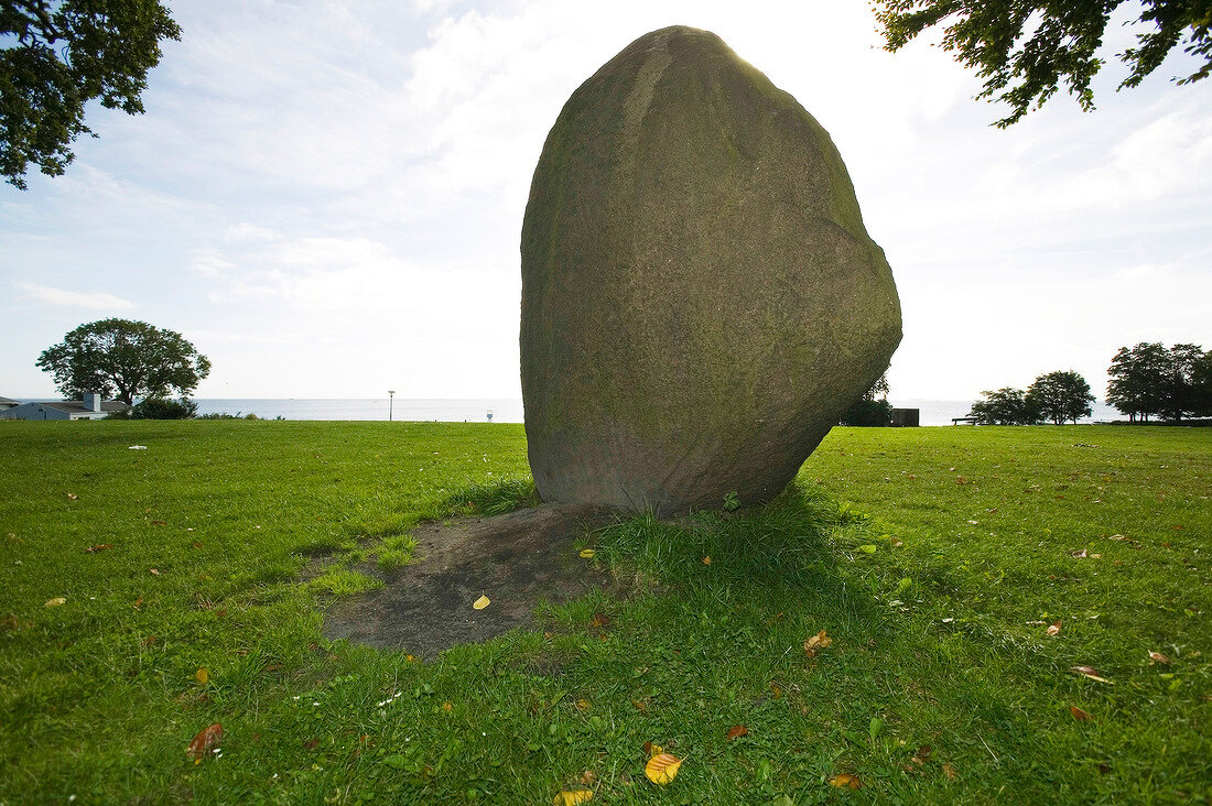 Large stone in garden at Klampenborg, Copenhagen, Denmark