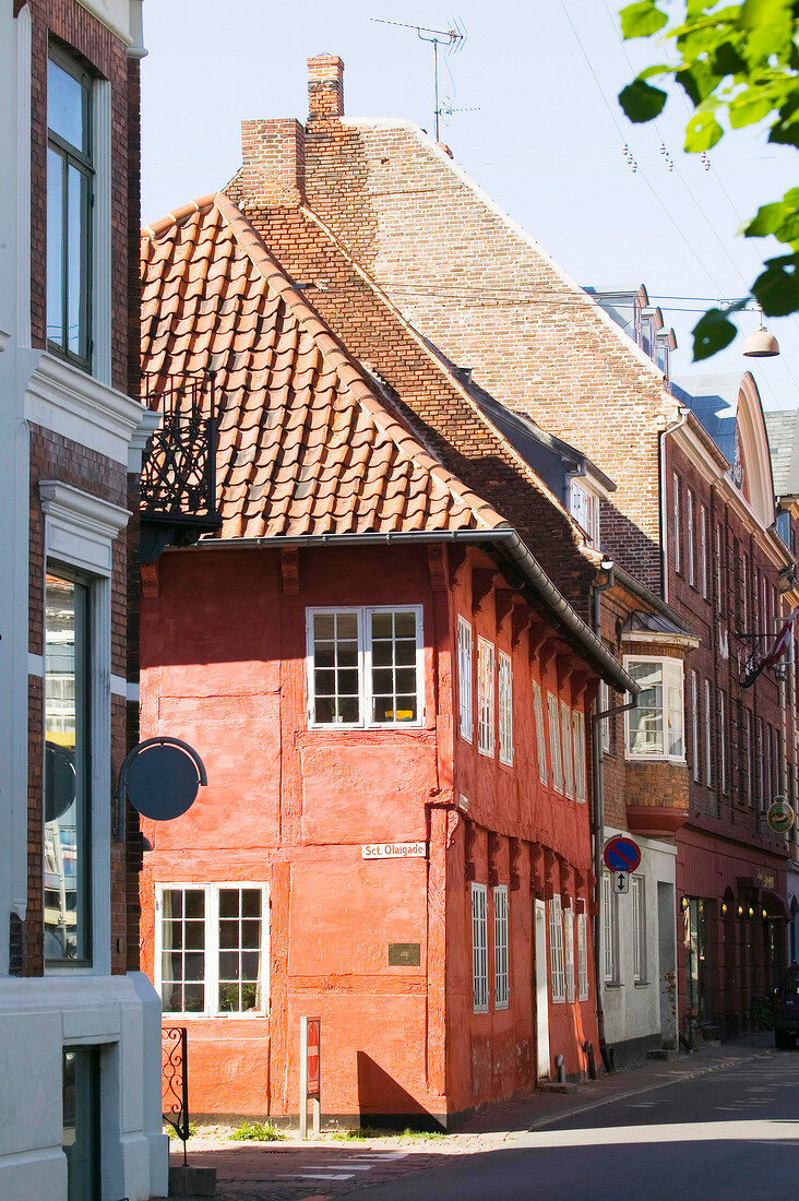 View of red tudor style house on street in Helsingor, Denmark