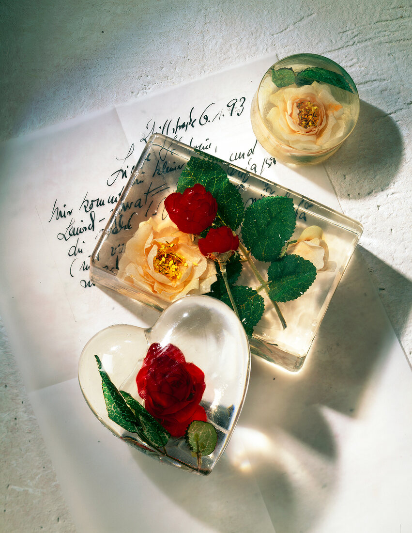 Glass paper weight with roses