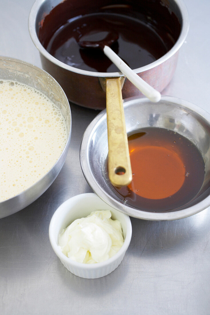 Ingredients of chocolate tart in bowls