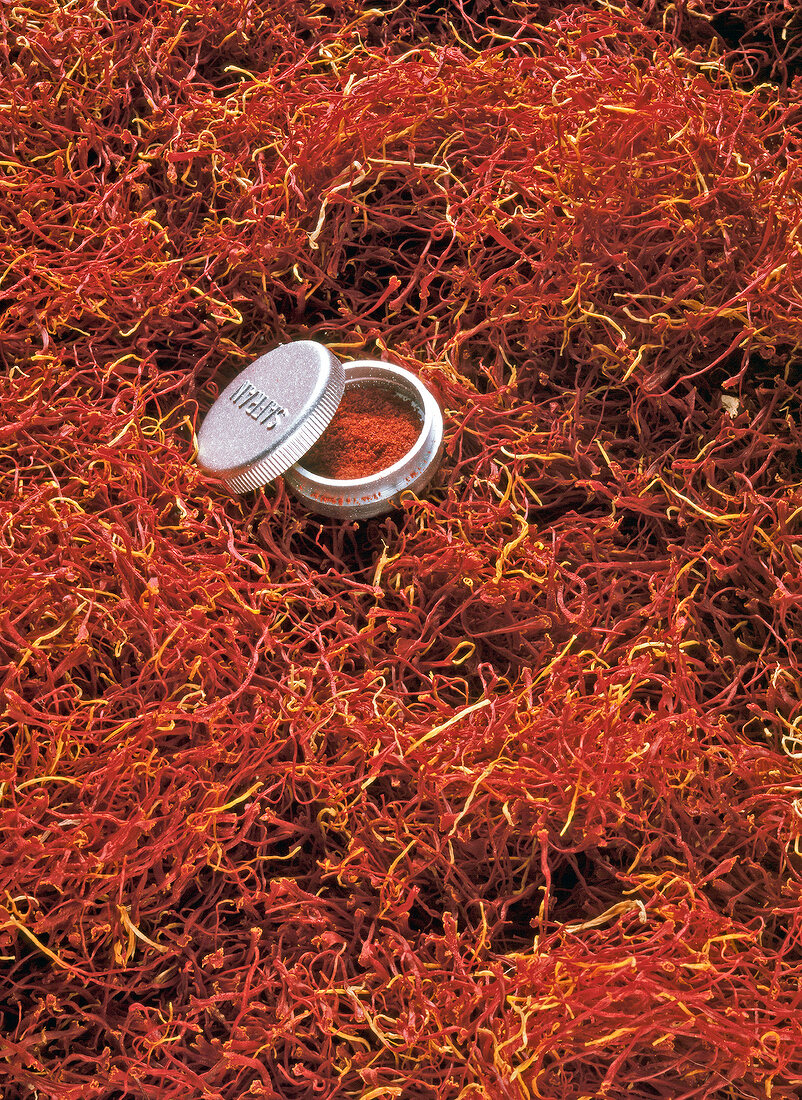 Close-up of saffron with saffron powder in box