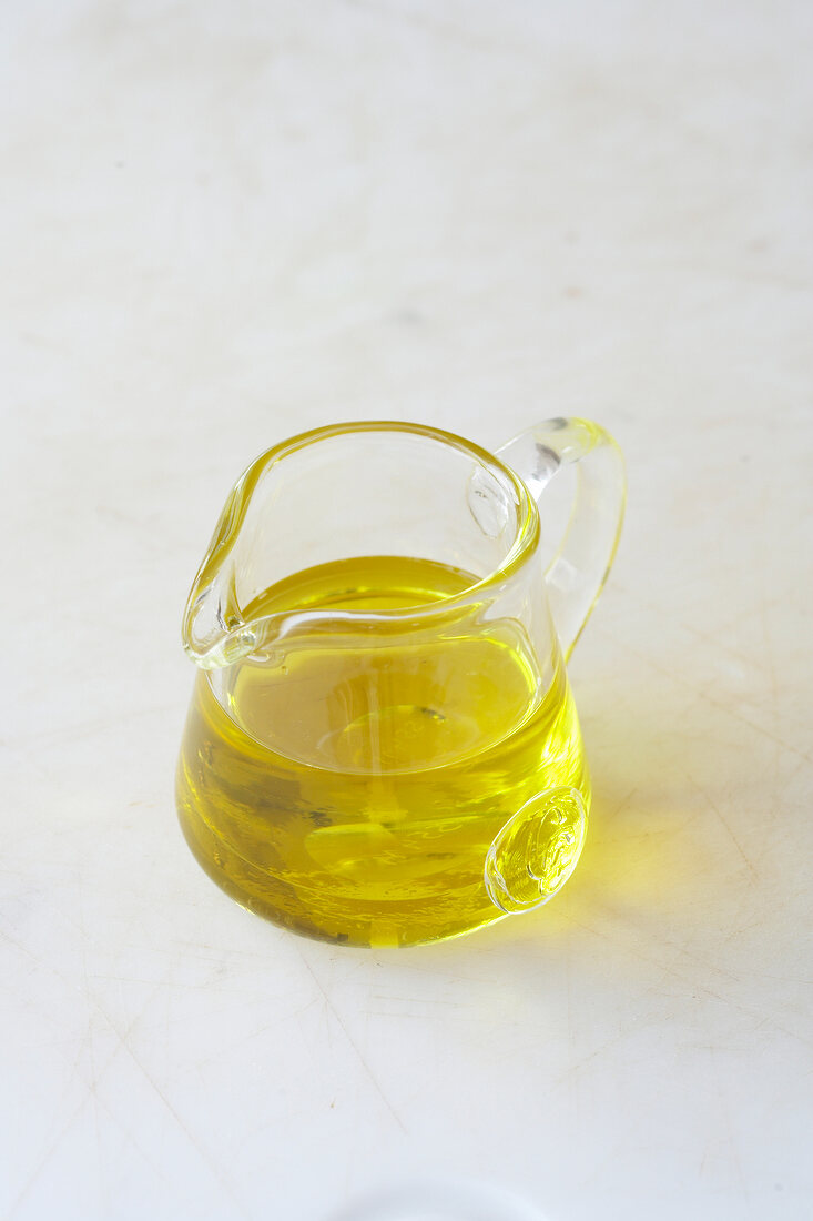 Oil in glass mug