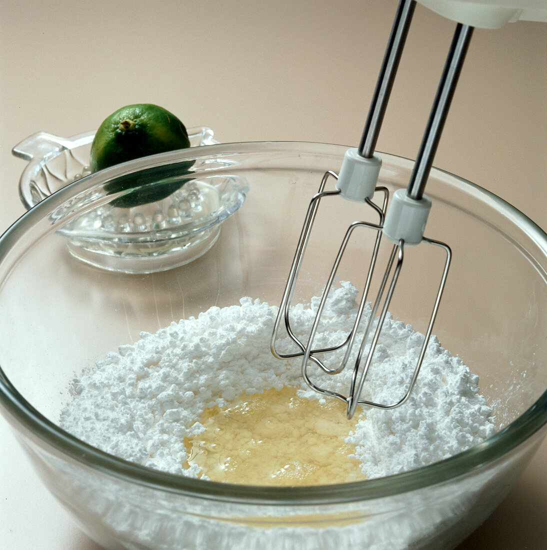 Egg and white glaze being whisked for preparation of dessert, step 1