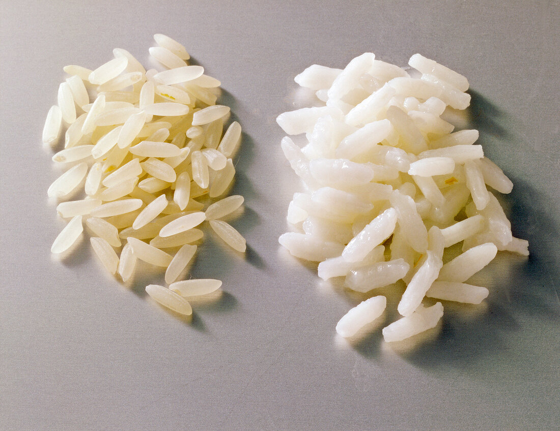 Close-up of raw and cooked rice, USA