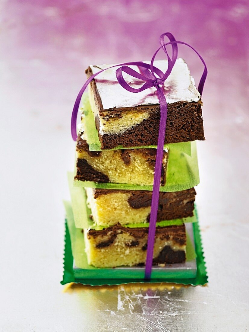 A stack of brownies tied with a bow