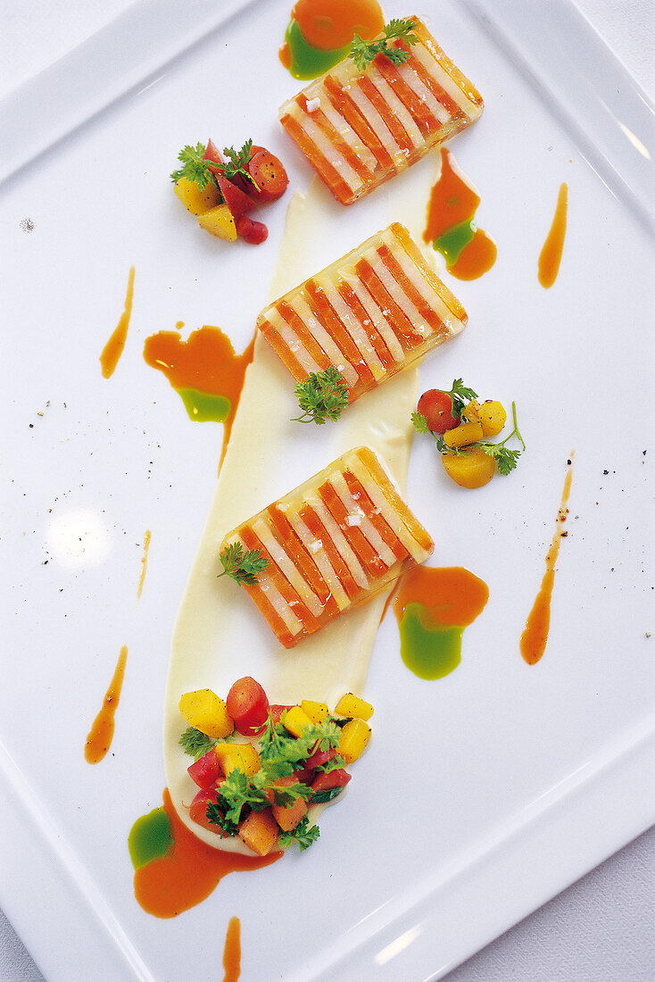 Terrine of carrots and parsnips with parsley oil in Avenues restaurant, Chicago, USA