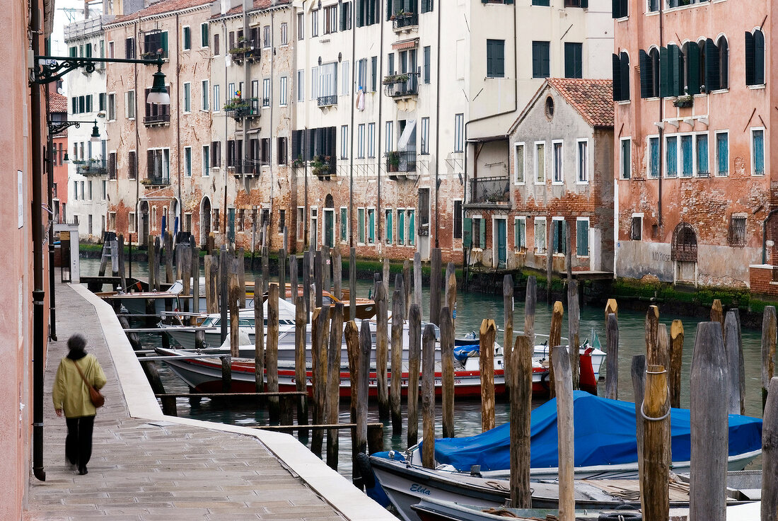 Gondolas moored in Misericordia Canal, Venice, Italy