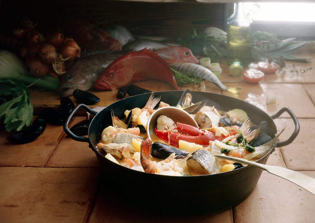Fish stew with vegetables in casserole