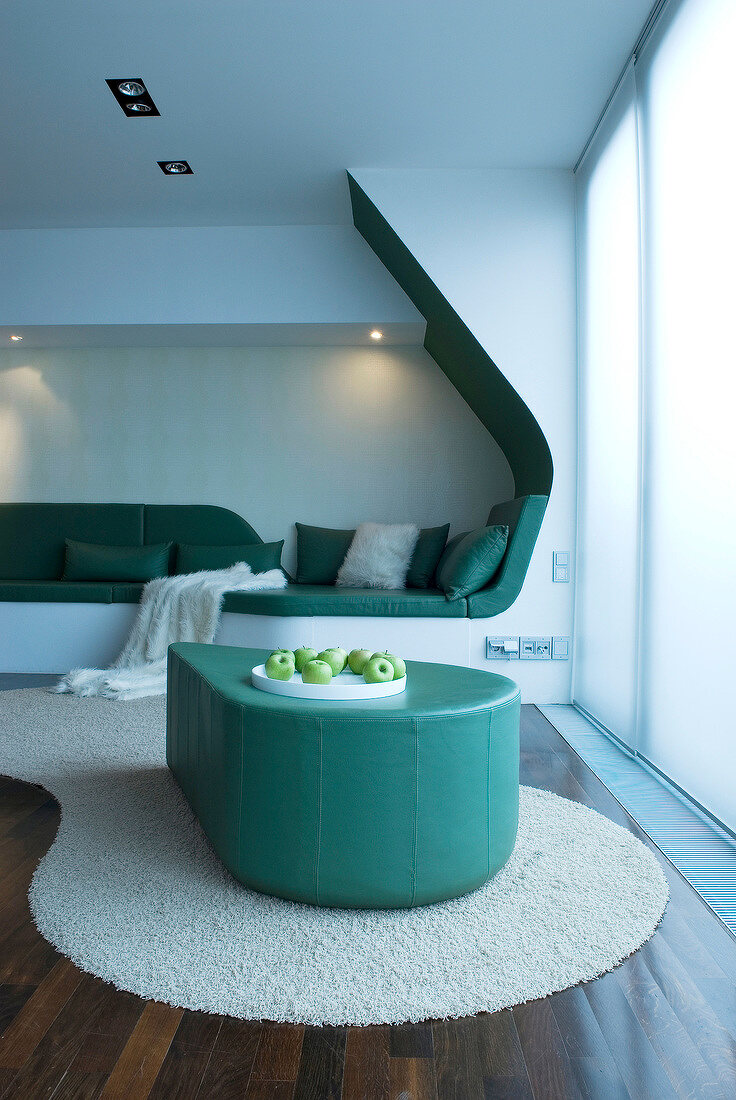 Comfortable seating and leather table in living room