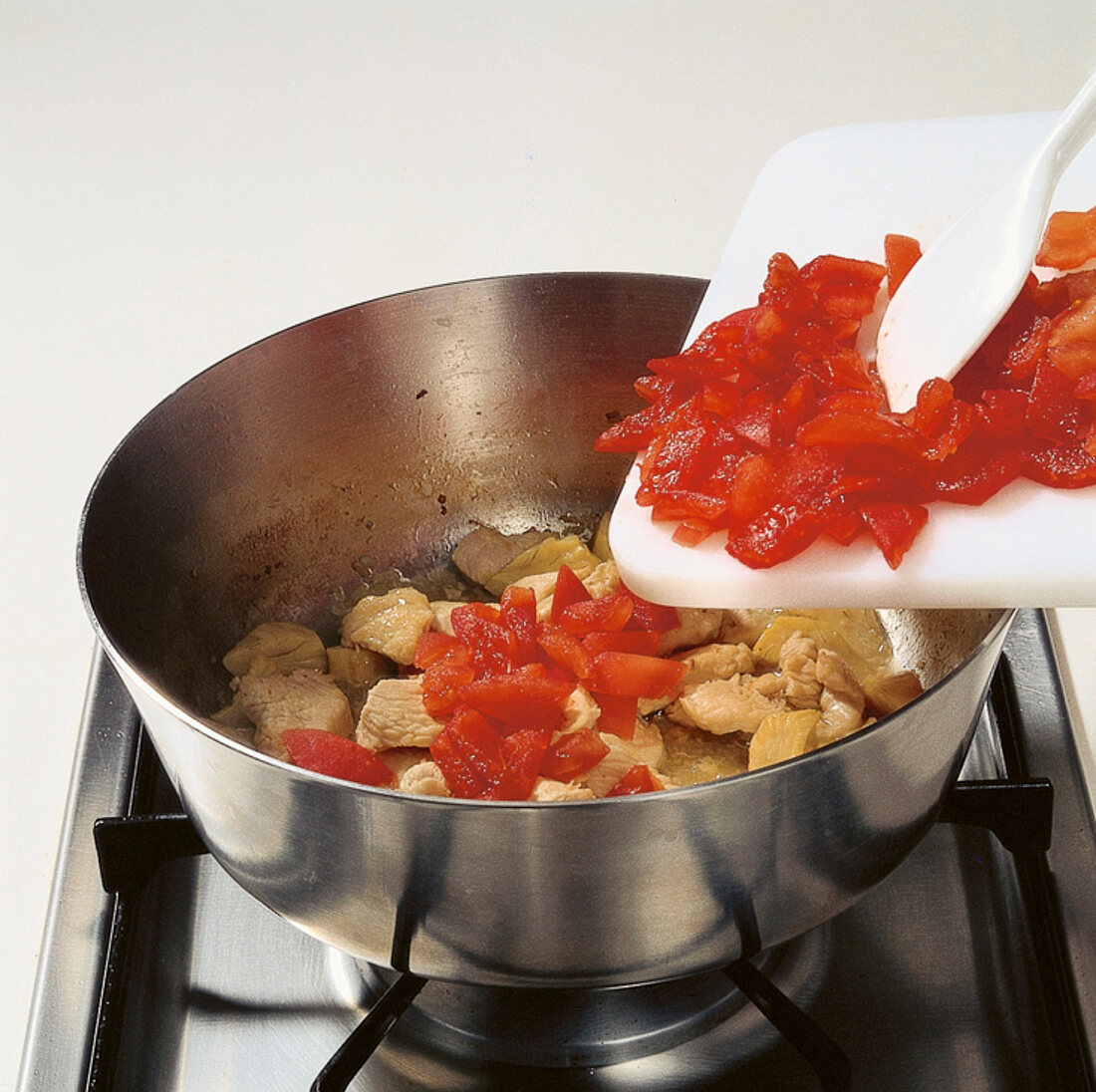 Buch vom Geflügel, Truthahngeschnetzeltes, Step 3, Tomaten geb.