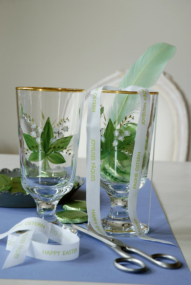 Glasses with lily of valley motif and eater tape on side