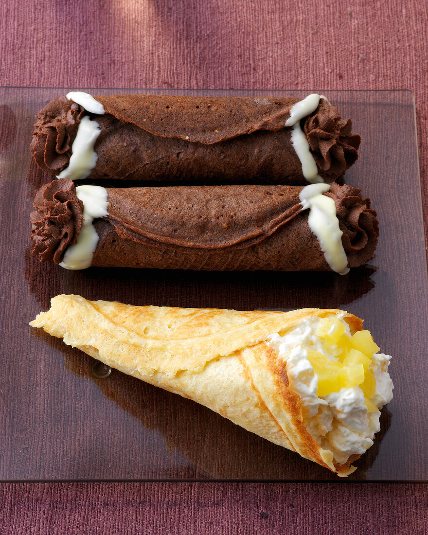 Coconut crepe with pineapple cottage cheese and schlotfeger with chocolate cream