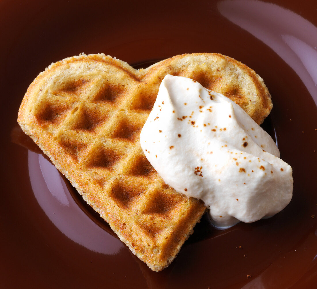 Close-up of nut waffles with cream